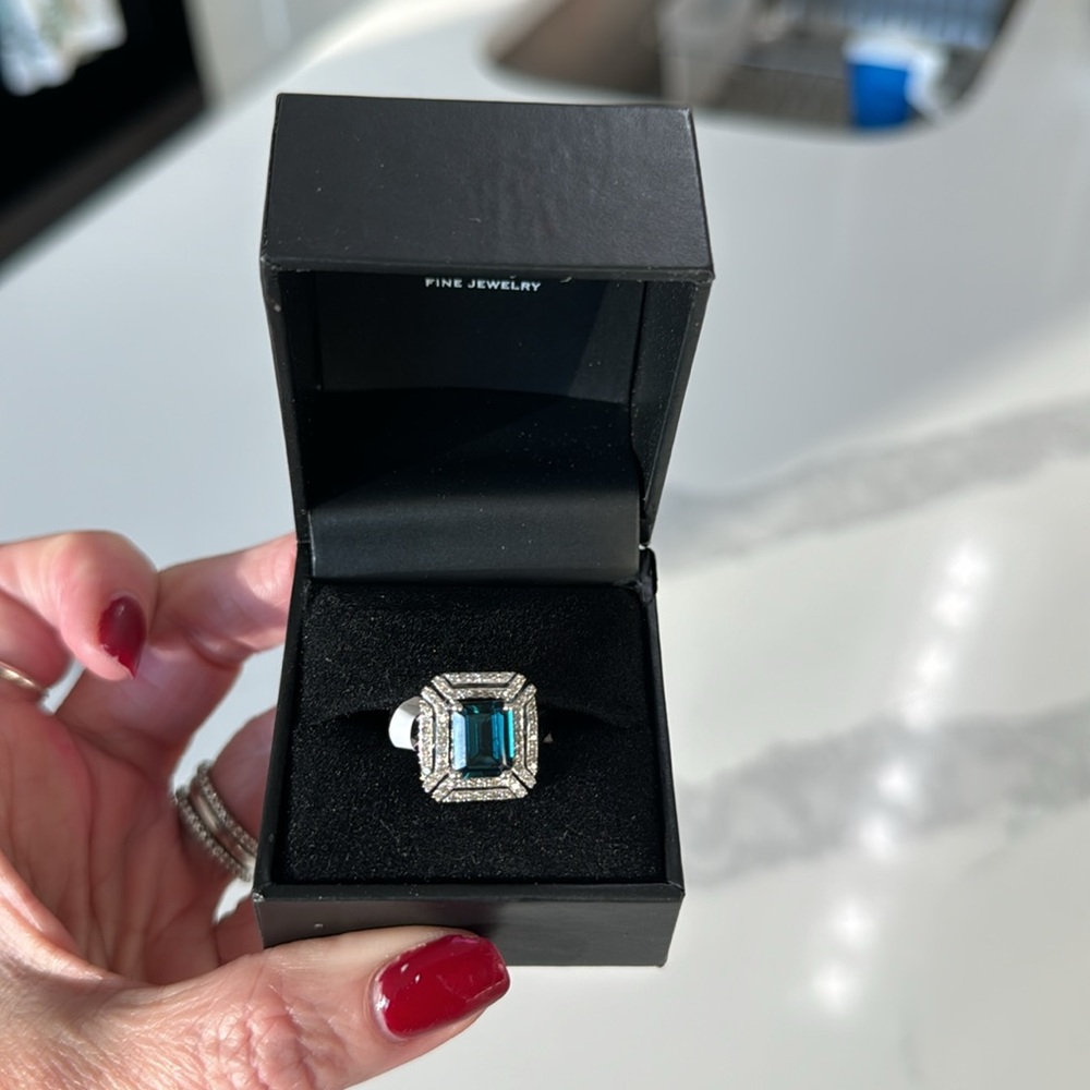 Blue Emerald-Cut Halo Ring with Diamond Accents